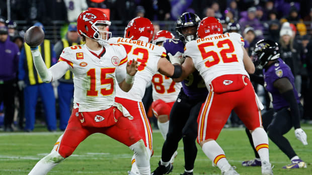 Jan 28, 2024; Baltimore, Maryland, USA; Kansas City Chiefs quarterback Patrick Mahomes (15) passes the ball against the Baltimore Ravens during the fourth quarter in the AFC Championship football game at M&T Bank Stadium. Mandatory Credit: Geoff Burke-USA TODAY Sports